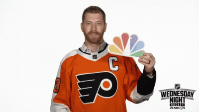 Man In Orange Jersey Holding Swipe Up Sign GIF