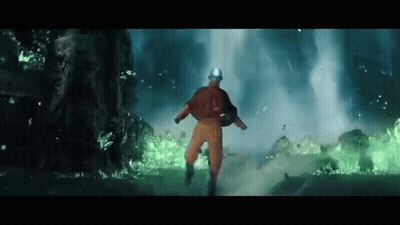 Man In Orange Jumpsuit Running In Front Of Waterfall GIF