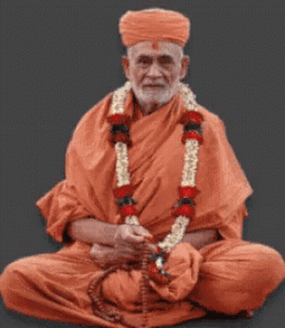 Man In Orange Robe Holding Globe And Candle GIF