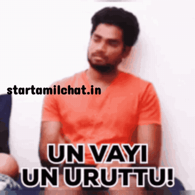 Man In Orange Shirt Arms Crossed Un Vayi Un Urttu GIF