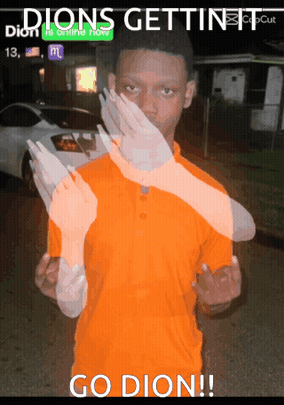Man In Orange Shirt Giving Middle Finger Dions Gettin It GIF