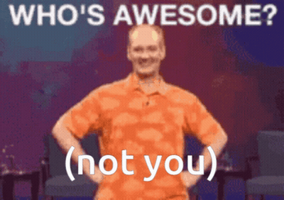 Man In Orange Shirt Hands On Hips Saying Who's Awesome Not You GIF
