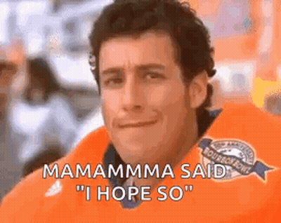 Man In Orange Shirt Making Funny Face Saying Mamamma I Hope So GIF