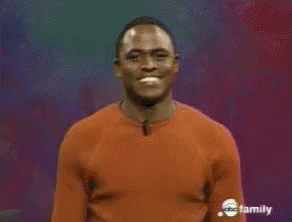 Man In Orange Shirt Saying Come On In GIF