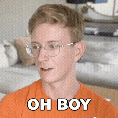 Man In Orange Shirt Saying Oh Boy GIF