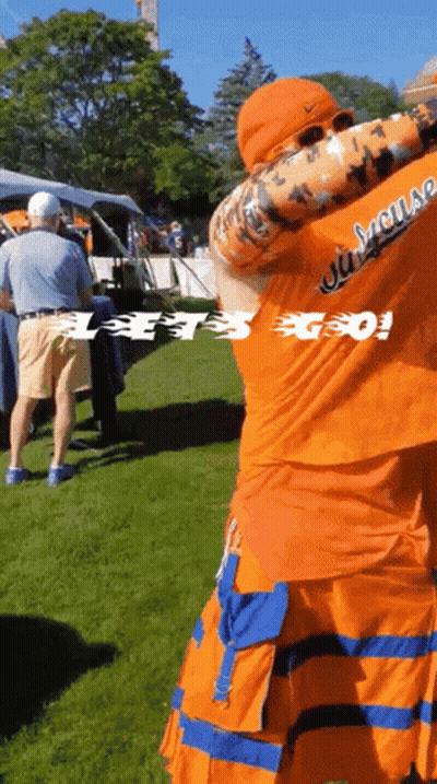 Man In Orange Shirt Saying Old House GIF