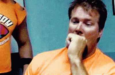 Man In Orange Shirt Saying Power GIF