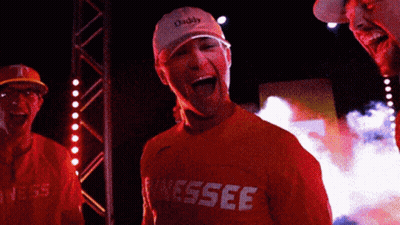 Man In Orange Shirt Saying Tennessee Laughing GIF