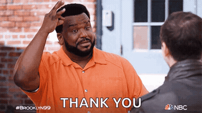 Man In Orange Shirt Saying Thank You To Another Man GIF
