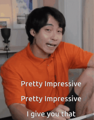 Man In Orange Shirt Says Pretty Impressive I Give You That GIF
