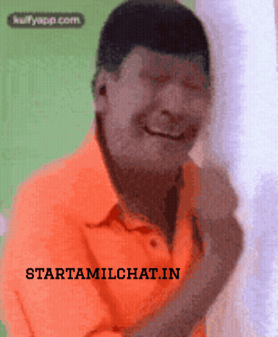 Man In Orange Shirt Smiling GIF