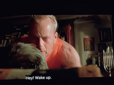 Man In Orange Shirt Talking GIF