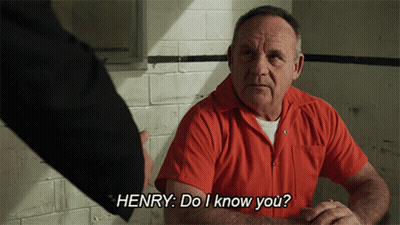 Man In Orange Shirt Talking To Henry GIF