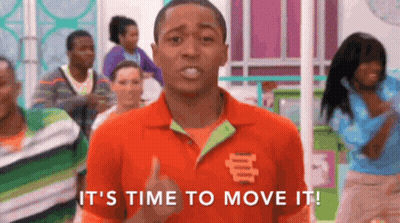 Man In Orange Shirt Thumbs Up Saying Time To Move It GIF