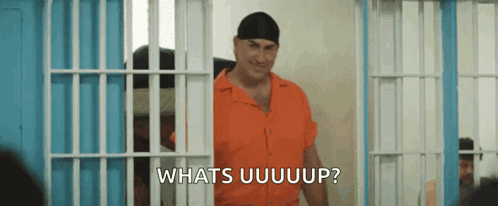 Man In Orange Shirt Whats Uuuuuuup GIF