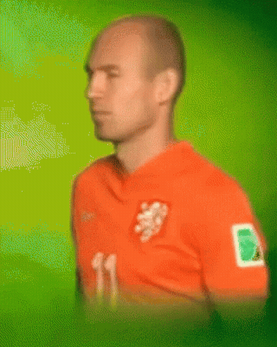 Man In Orange Shirt With Lion GIF
