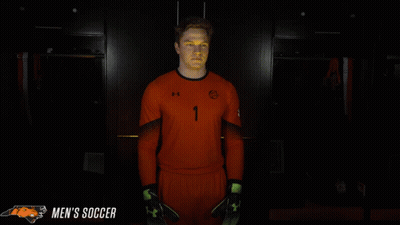 Man In Orange Soccer Uniform Number 1 GIF