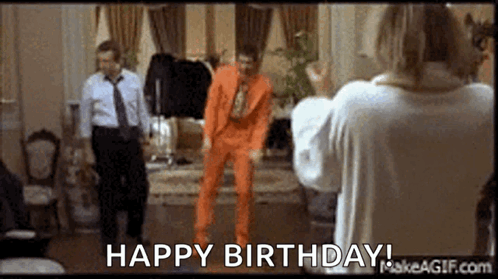 Man In Orange Suit Dancing GIF