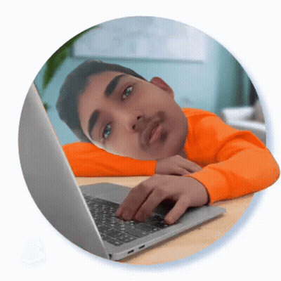 Man In Orange Sweater Using Laptop GIF