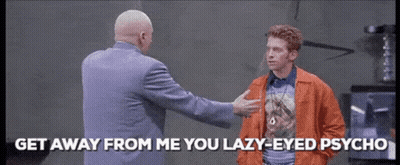 Man In Orange Talking To Purple Suit GIF