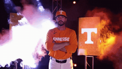 Man In Orange Tennessee Jersey With Arms Crossed GIF