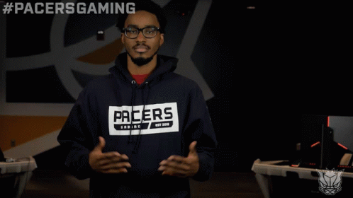 Man In Pacers Hoodie Holding Hands Out GIF