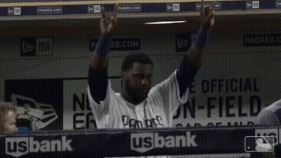 Man In Padres Jersey Hands In Air In Dugout GIF