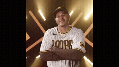 Man In Padres Jersey With Arms Crossed Smiling GIF
