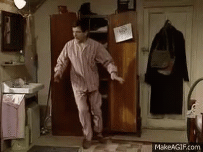 Man In Pajamas Dancing In Front Of Wardrobe GIF