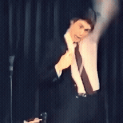 Man In Pajamas Says By All Means Schitt's Creek Sign GIF