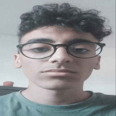 Man In Palm Tree Shirt Talking On Phone GIF