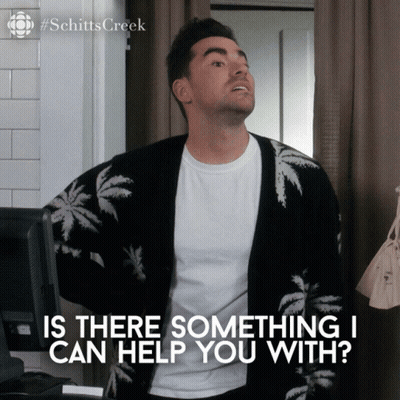 Man In Palm Tree Sweater Asking Can I Help You GIF