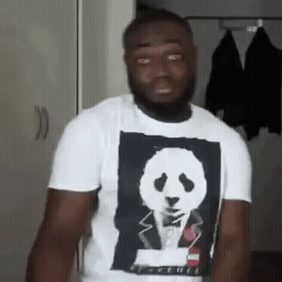 Man In Panda T-Shirt Standing In Front Of Door GIF