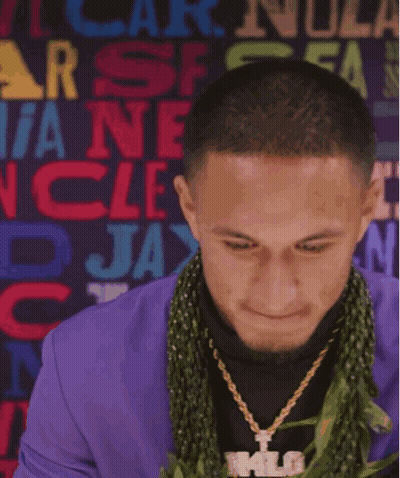 Man In Panthers Hat And Purple Jacket GIF