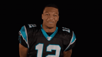 Man In Panthers Jersey Smiling And Clapping GIF