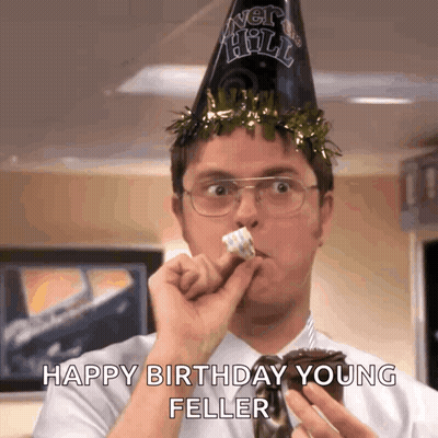 Man In Party Hat Eating Cake GIF