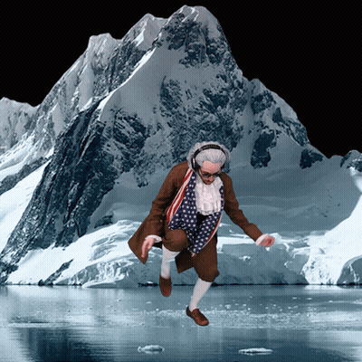 Man In Patriotic Outfit Jumping By Snowy Mountain GIF