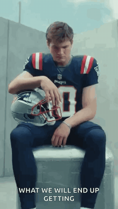 Man In Patriots Jersey Sitting On Cooler With Helmet GIF