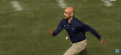 Man In Penn State Shirt Running On Field GIF