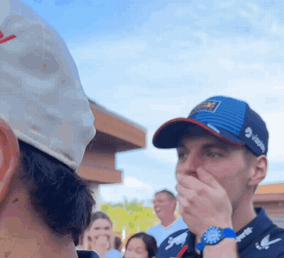 Man In Pepsi Hat Covering Mouth GIF