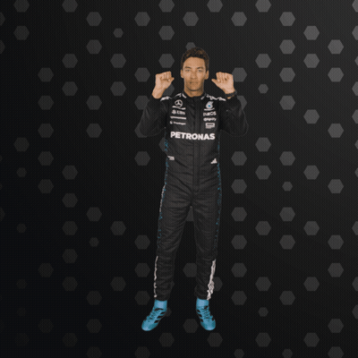 Man In Petronas Racing Suit Giving Thumbs Up GIF