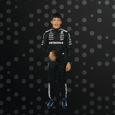 Man In Petronas Suit Fist Up GIF