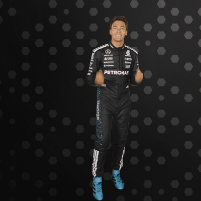 Man In Petronas Suit With Hands Outstretched GIF