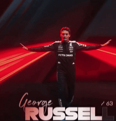 Man In Petronas Uniform Arms Outstretched George Russell GIF