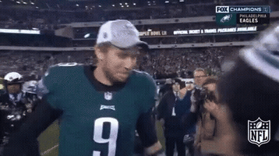 Man In Philadelphia Eagles Jersey And Hat On Football Field GIF
