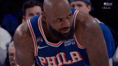 Man In Philadelphia Jersey Looking Down GIF