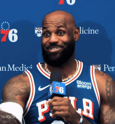 Man In Philadelphia Jersey Talking Into Microphone GIF