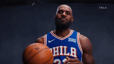 Man In Phillies Jersey Holding Basketball GIF