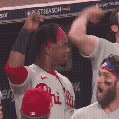 Man In Phillies Jersey Raising Fist GIF