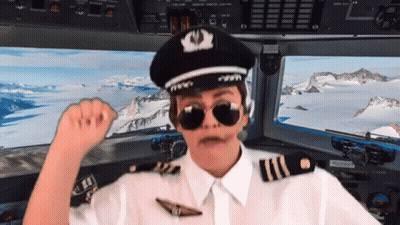 Man In Pilot's Uniform With Hat And Sunglasses GIF